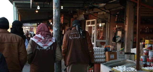 عناصر "الحسبة" المسؤولة عن الاستخبارات المحلية لتنظيم داعش ينتشرون في شوارع الموصل