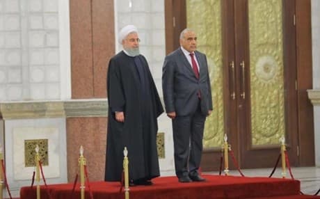 رئيس الوزراء العراقي خلال استقباله ببرئيس الايراني في بغداد