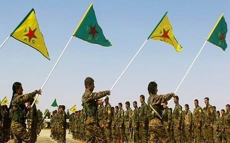 مقاتلون ومقاتلات من وحدات حماية الشعب ووحدات حماية المرأة الكورديتين - أرشيفية