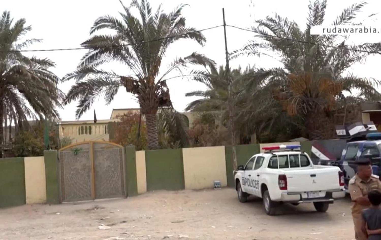 سيارة شرطة في موقع الجريمة