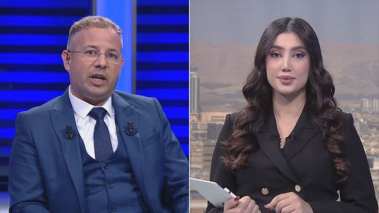 مذيعة قناة رووداو نما نبز مع الخبير الألماني رامون هانسماير