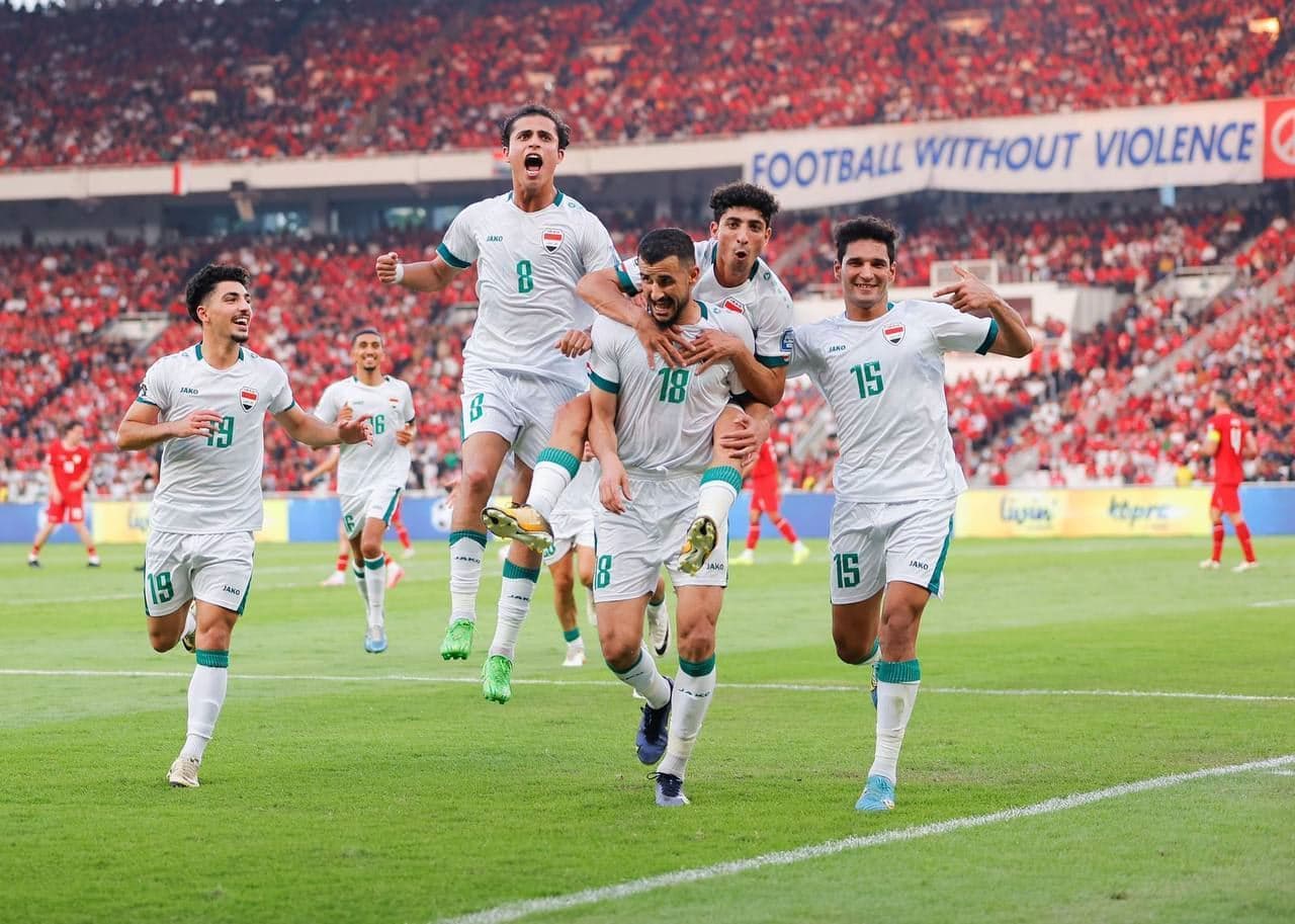 فرحة لاعبي المنتخب العراقي بتسجيل الهدف على أندونيسيا في 6 حزيران - AFP
