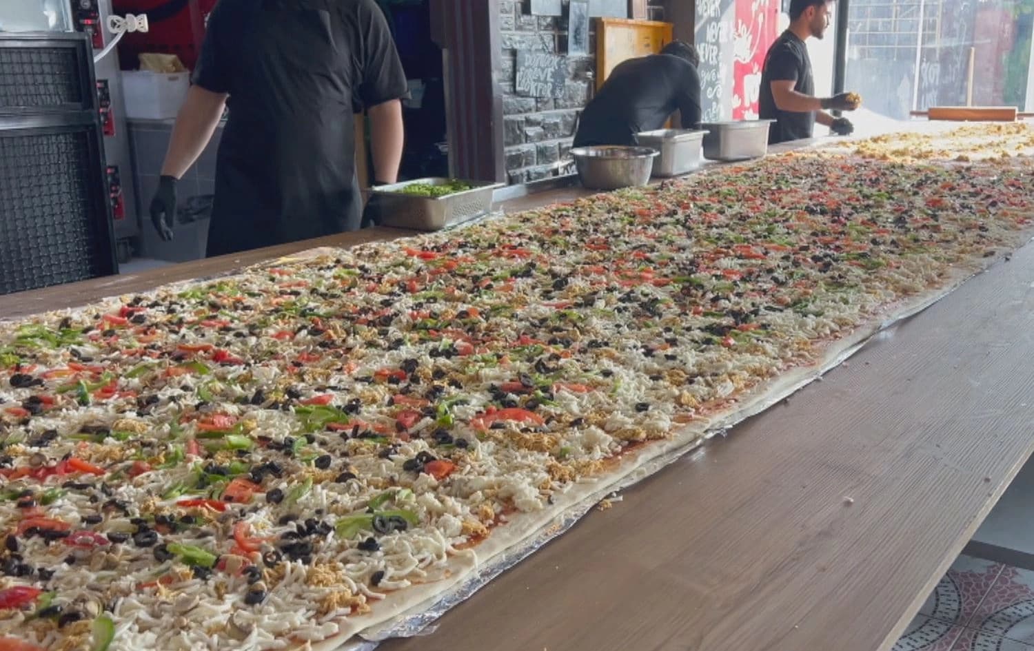 أكبر بيتزا في إقليم كوردستان والعراق حسب الطاه
