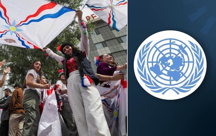 صورة لشعار الأمم المتحدة والمحتفلين بأكيتو في دهوك