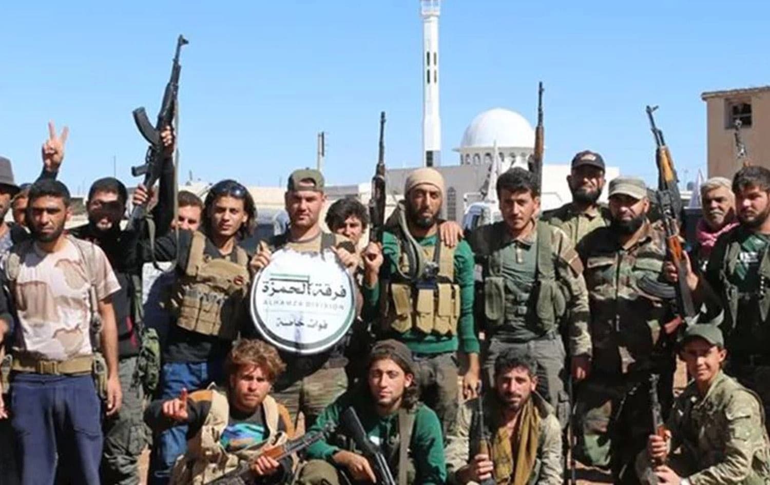 صورة أرشيفية لعناصر من فرقة "الحمزة"