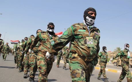 عناصر مسلحة تستعرض وسط بغداد
