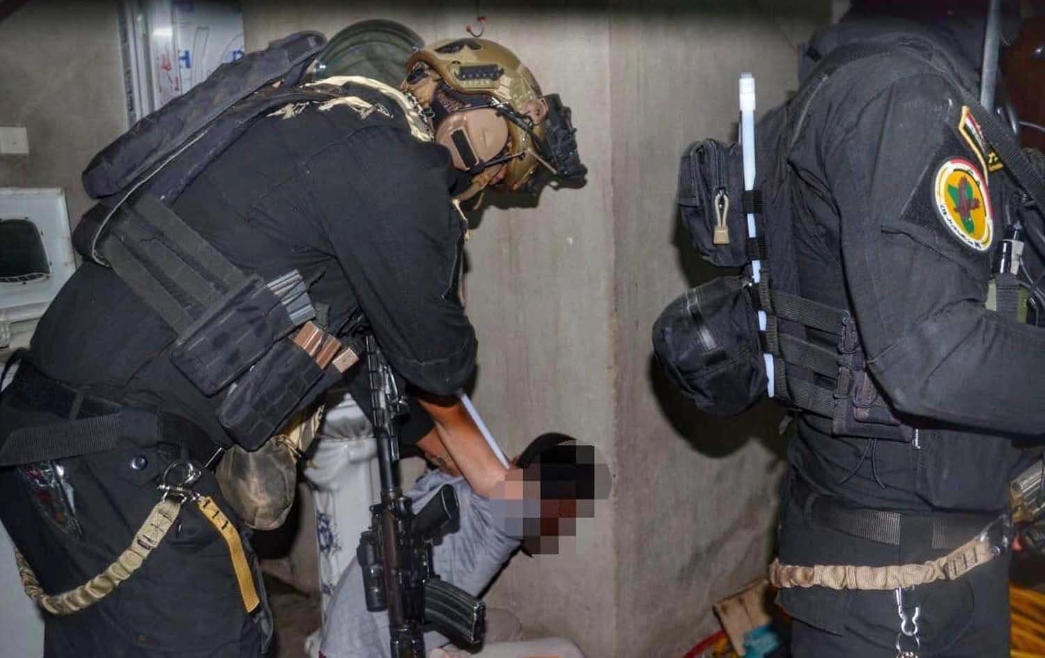 القوات الأمنية تقبض على أحد المشاركين في مجزرة سبايكر