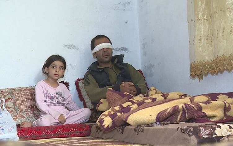 اللاجئ أحمد محمد خليل فاقد البصر في أحد مخيمات إقليم كوردستان