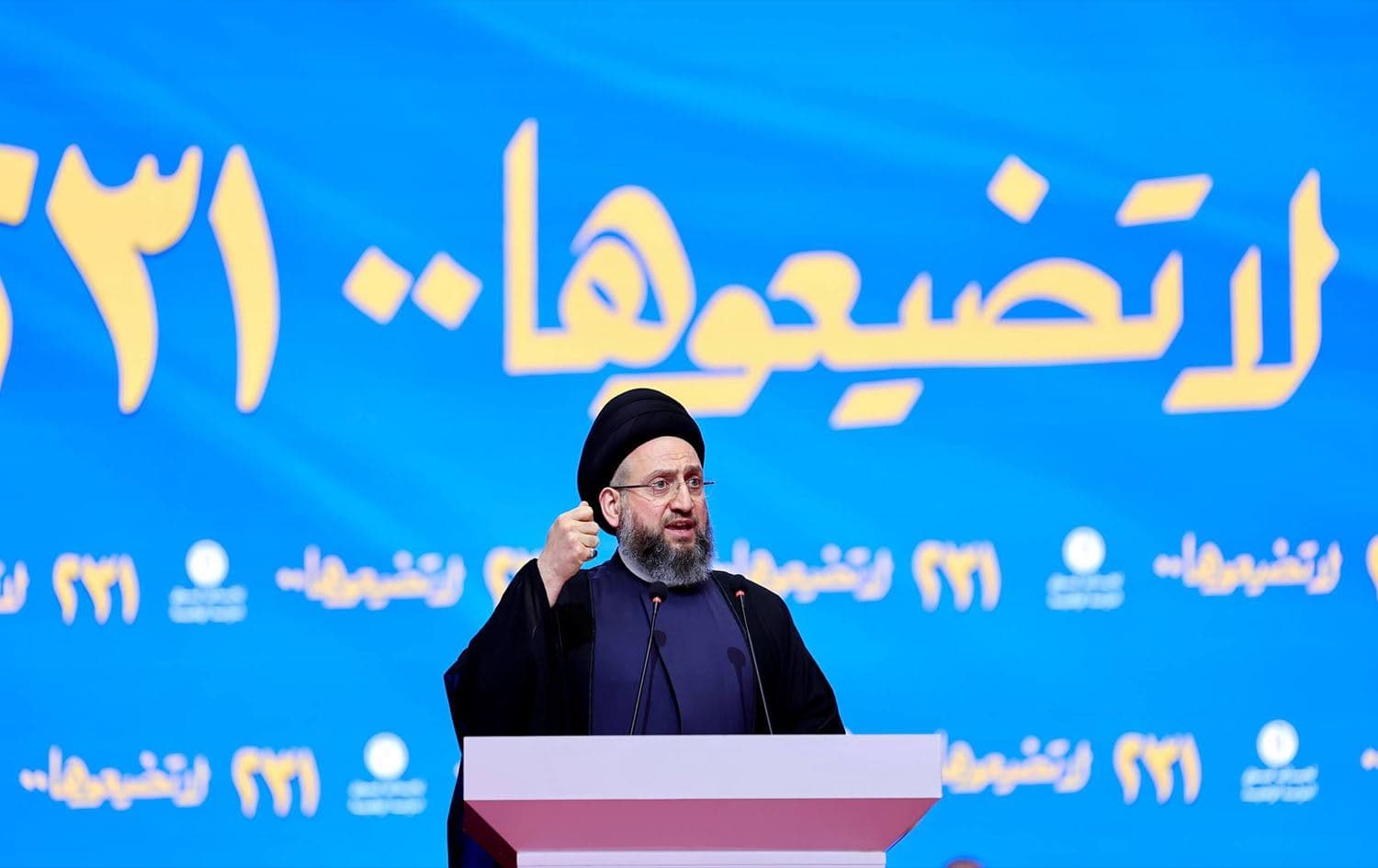 الحكيم خلال المؤتمر